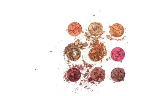 Crushed eye shadow kit as a sample of makeup product Stock Photos