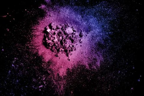 Crushed eye shadow texture. Neon palette make up powder swatch Stock Photos