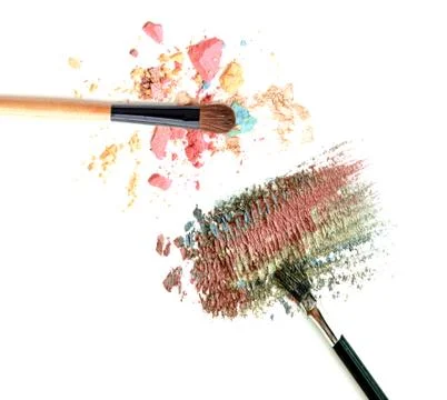 Crushed eyeshadow make up brush isolate Stock Photos