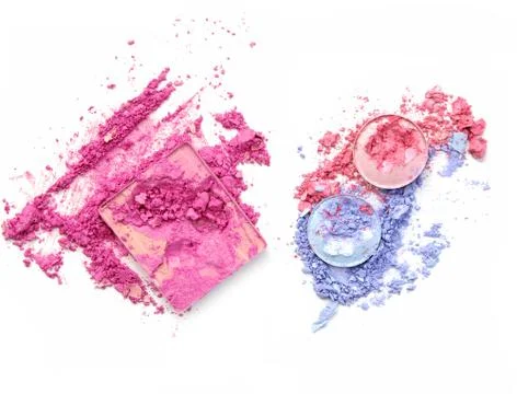 Crushed eyeshadows mixed on white background. Stock Photos