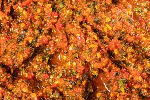 Crushed hot pepper with aromatic herbs Foto stock