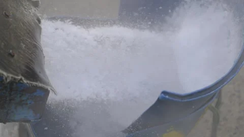 Crushed Ice Pouring into Blue Container at Vietnam Fish Market Stockbeeldmateriaal 340458227