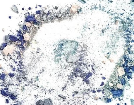 Crushed makeup on white background. The eye shadows. Stock Photos