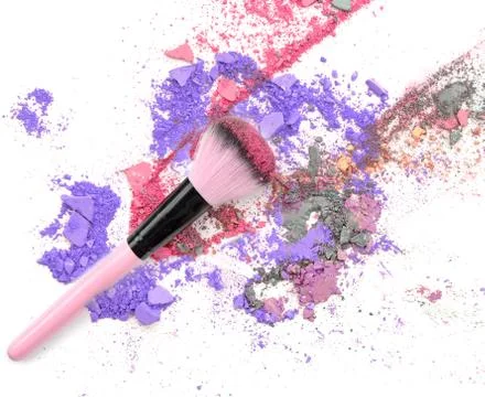 Crushed makeup on white background. The eye shadows. Stock Photos