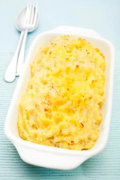 Crushed mashed smashed potato gratin Stock Photos