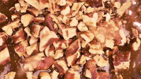 Crushed nuts and caramel close up, homemade candies and confectionery concept. 스톡 동영상 282658753