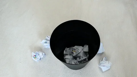 Crushed Paper Thrown into Bin Stock Footage 89317043