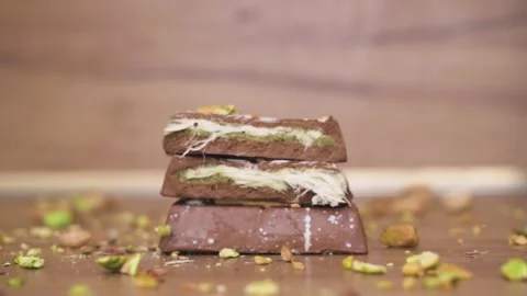 Crushed Pistachios on Dubai Chocolate Candy Stock Footage 313615341