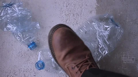 Crushed plastic bottle ready for recycling used plastic bottle squashed plastic Stock Footage 325513122