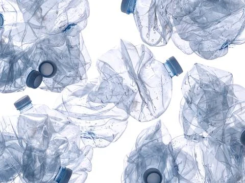 Crushed plastic bottles pattern background representing environmental polluti Stock Photos