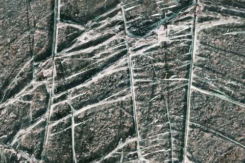 Crushed plastic plexiglass texture, abstract window surface with cracks pattern Stock Photos