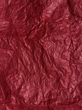 Crushed red paper texture, red background Foto stock