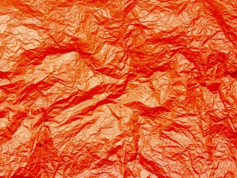 Crushed red paper texture, red background Foto stock