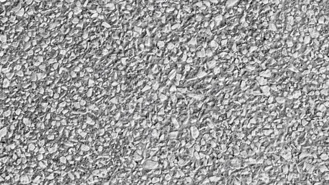 Crushed stone embedded in cement mortar rotating, turning, close-up macro, .. Stock-Footage 256322725