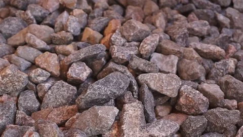 Crushed stone in hands Stock Footage 74909026
