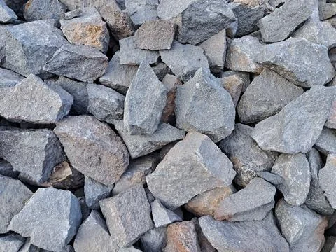 Crushed stone rocks texture background Stock Photos
