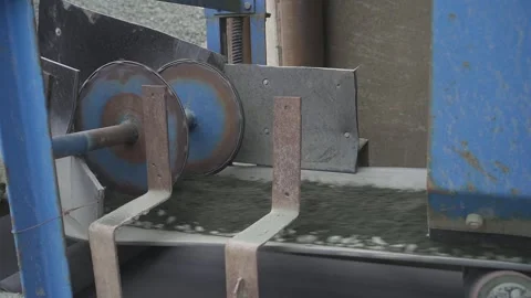 Crushed stone is transported closeup on a mobile canvas. running belt Stock Footage 145411262