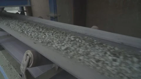 Crushed stone is transported on a mobile canvas. running belt Video stock 145411246