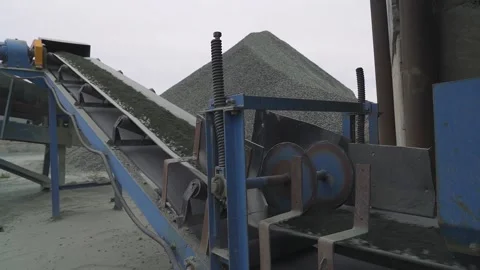 Crushed stone is transported on a mobile canvas. running belt Stock Footage 145411264