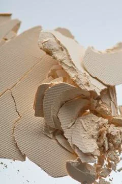 Crushed texture of light beige eye shadow or powder Stock Photos