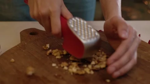 Crushed Walnuts. Chopping walnuts on a cutting board Stock-Footage 155124854