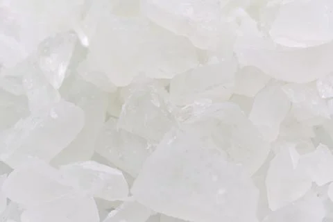 Crushed white salt on a plain surface in natural light Fotos de archivo