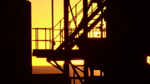 Crusher silhouette sunset Stock Footage 55040028