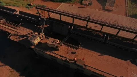 Crushing and sizing plant. Processing of mineral resources. Excavator unloads Stock-Footage 74194970