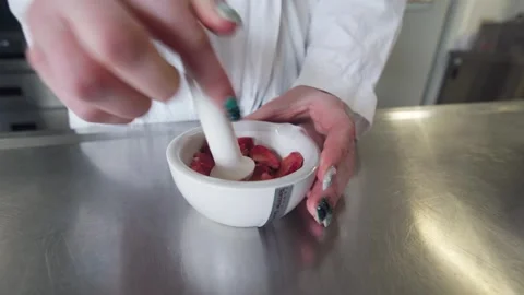 Crushing dried strawberries Stock Footage 315505730