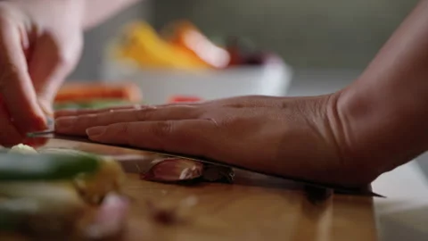 Crushing Garlic in Slowmotion Stock Footage 254590527