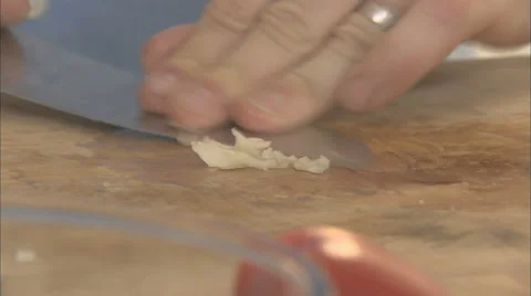 Crushing garlic using a knife 스톡 동영상 39588902