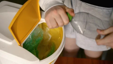 Crushing plastic bottle for recycling 스톡 동영상 336684847
