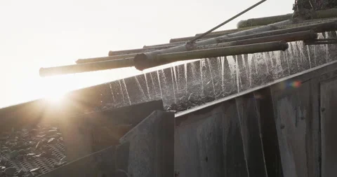Crushing screening plant. Rocks and sand move through vibrating screen Stock Footage 288732699