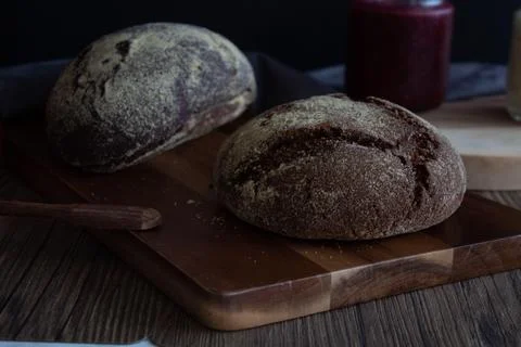 Crusty Artisan Rye Bread in a Rustic Setting Stock Photos