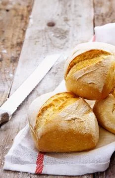 Crusty golden bread rolls Stock Photos