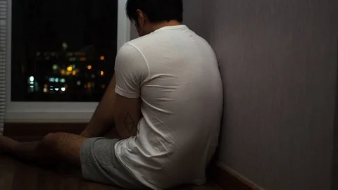 Crying and sitting at windows at night Video stock 89491497