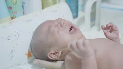 Crying Baby in a Soft Background Stock Footage 318629212