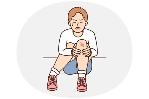Crying boy sits on ground and holds on to injury on knee after fall during walk Stock Illustration