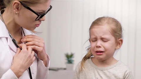 Crying child curing in clinic Stock Footage 72614635