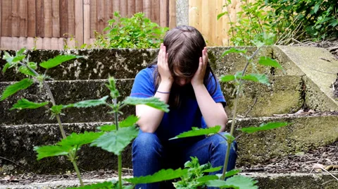 Crying child, head in hands. Stock Footage 39076966