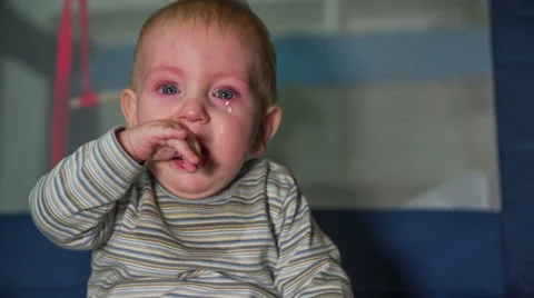 Crying children before playpen Stock Footage 44643977