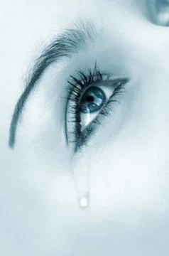 Crying eye. blue highkey version Foto stock