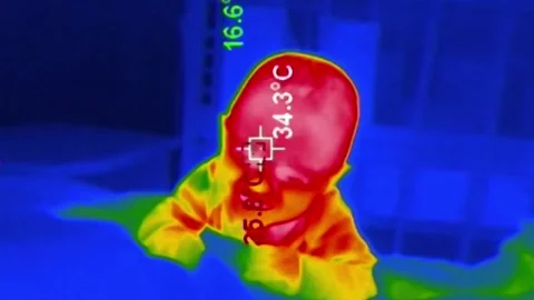 Crying Infant Crawling On Bed Seen Through Infrared Thermal Imaging Camera Stock-Footage 330283688