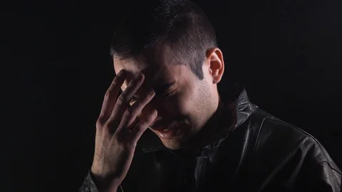 Crying Men Full Of Regrets in Darkness Stock Footage 105297923