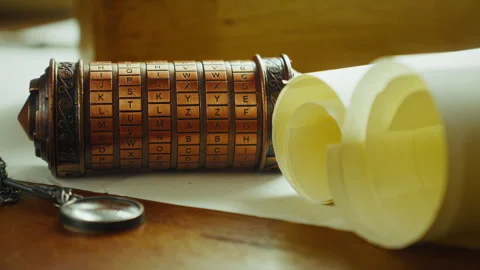Cryptex Puzzle with Scrolls and Magnifier, Secret Code and Mystery Stock Footage 334358867