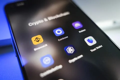 Crypto and blockchains apps on smartphone screen Stock Photos