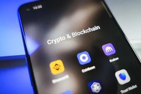 Crypto and blockchains apps on smartphone screen Stock Photos
