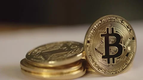 Crypto coins, both round and small, rise and fall at fortune’s call Stock Footage 296208825