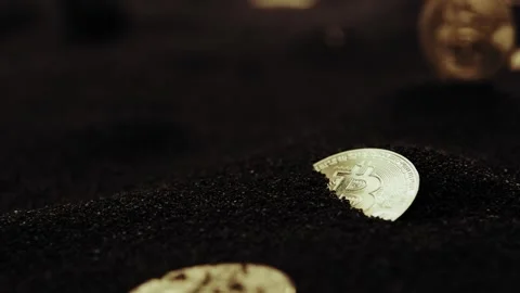 Crypto currency Bitcoin extreme close up stock footage. Golden BTC coins.  Stock Footage 253576498