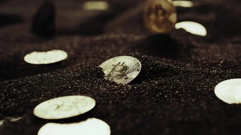 Crypto currency Bitcoin extreme close up stock footage. Golden BTC coins.  Stock Footage 253576504